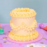 Vintage Cake - Single Colour by Crumbs & Doilies with tall 6-layer sponge and hand-piped Swiss Meringue icing.